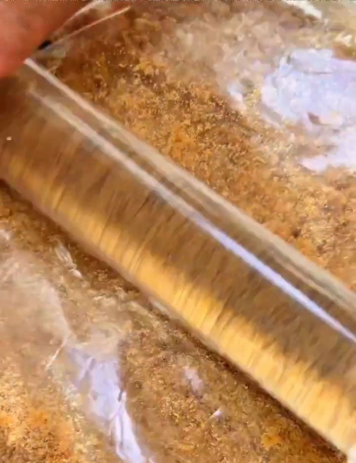 Place the digestive biscuits in a zip bag and crush them into fine crumbs using a rolling pin