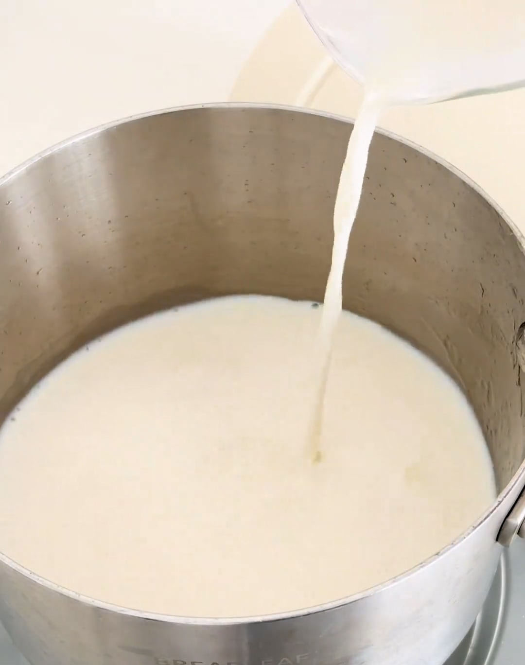 Pour in the milk, heavy cream