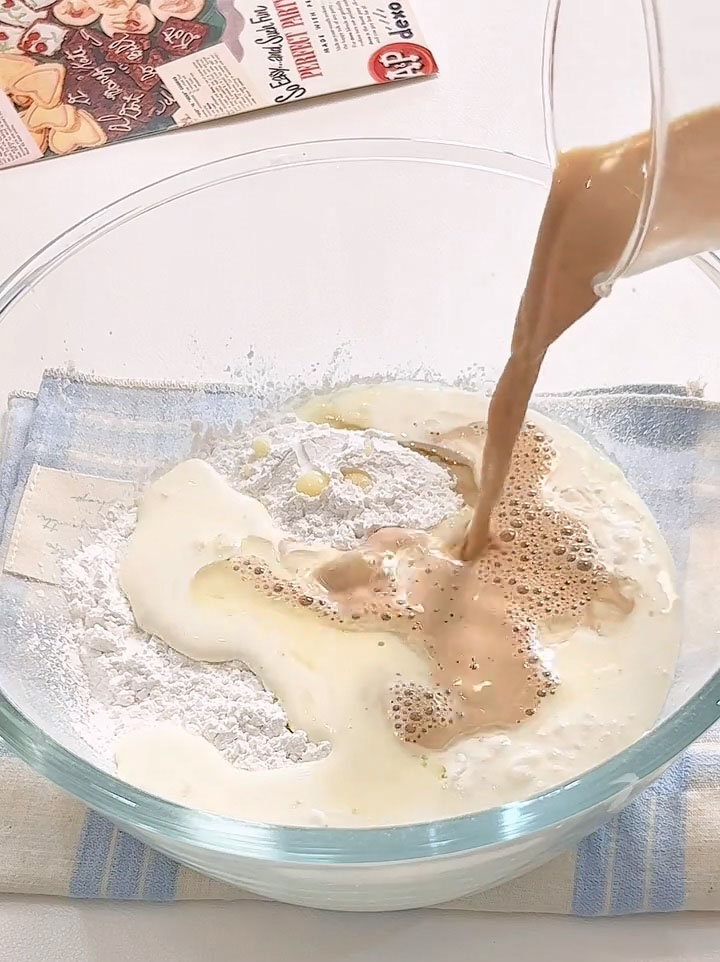 Pour in the prepared Earl Grey infused milk