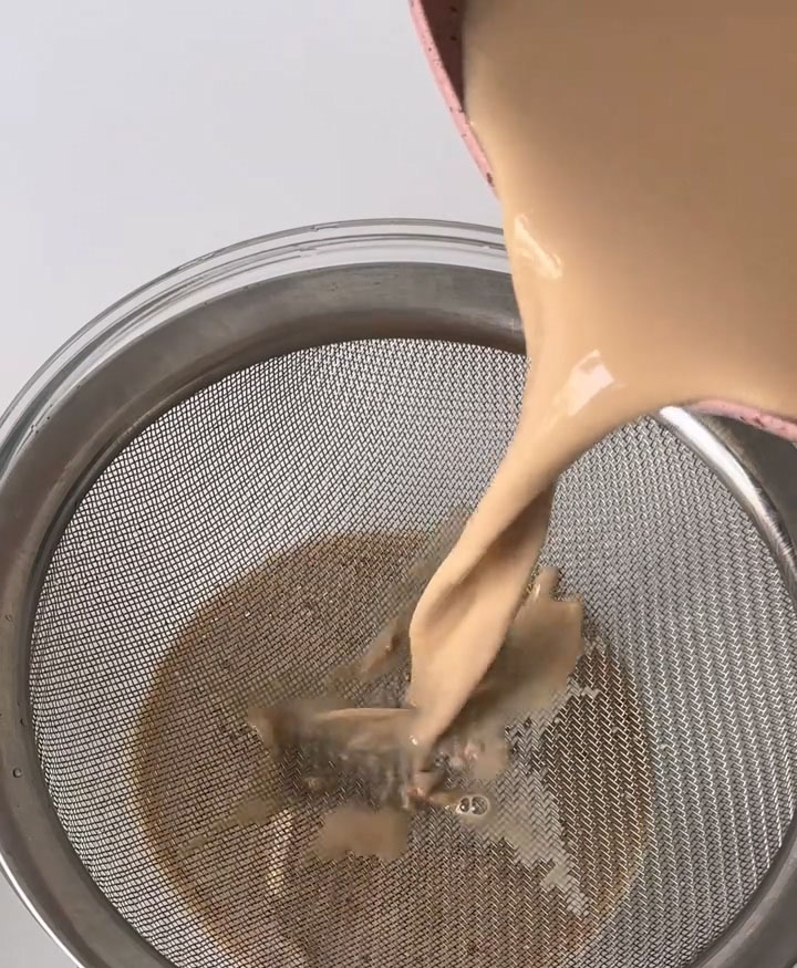 Pour the entire panna cotta mixture through the sieve