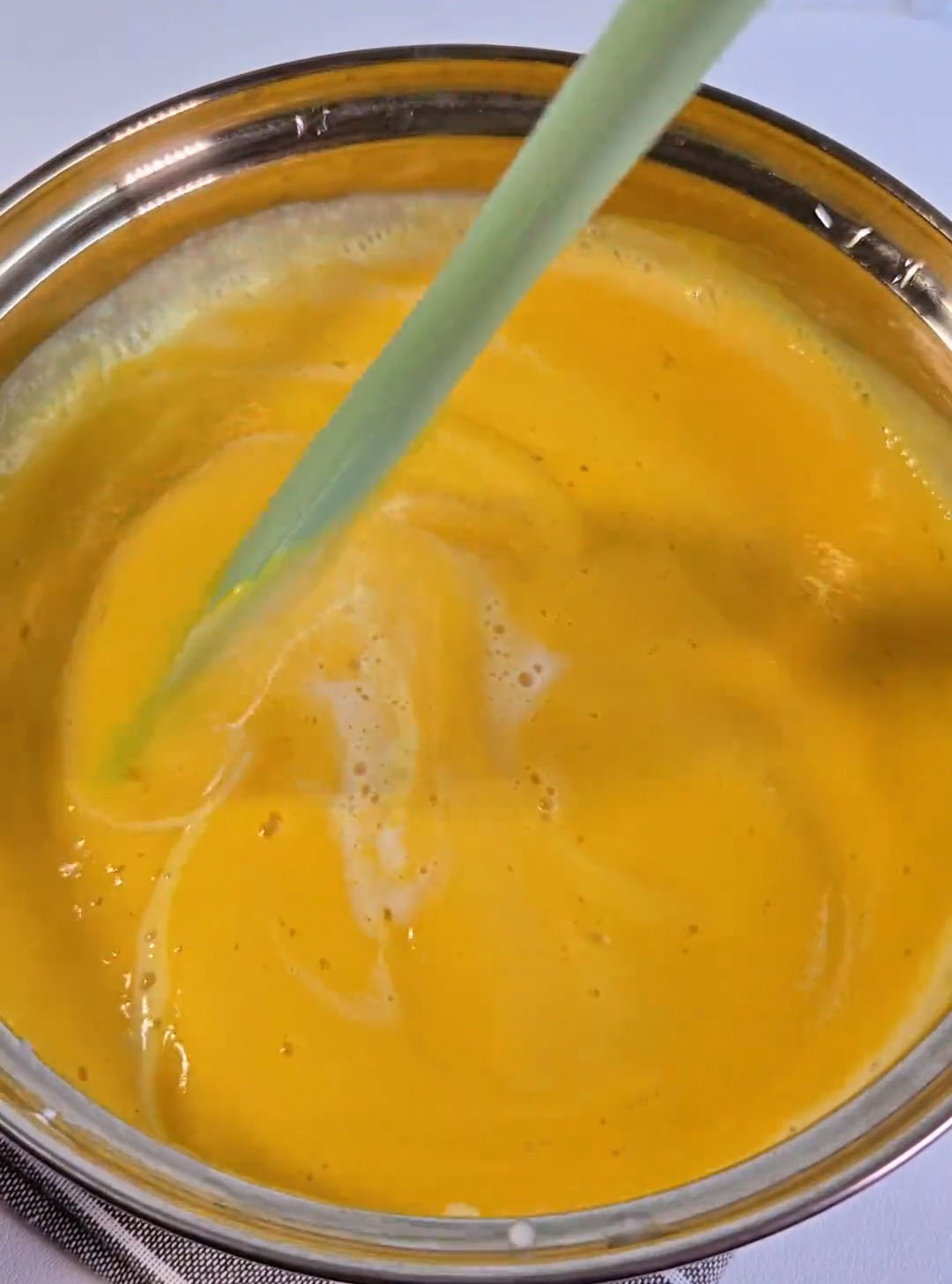 Pour the mango milk mixture from step 1 into the gelatin milk mixture