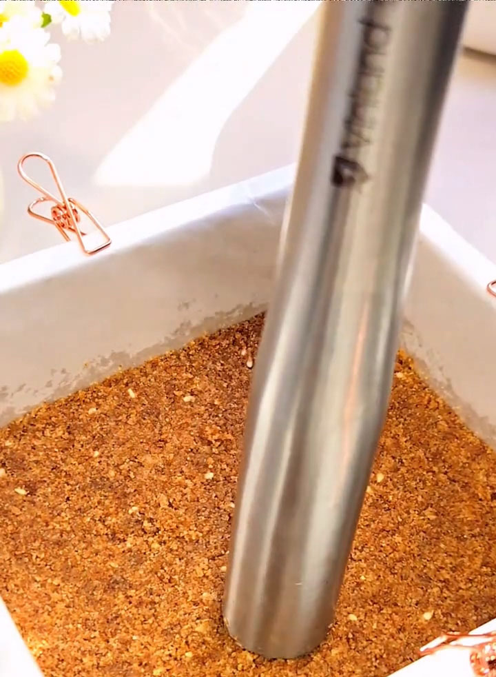 Press the mixture firmly into a square pan