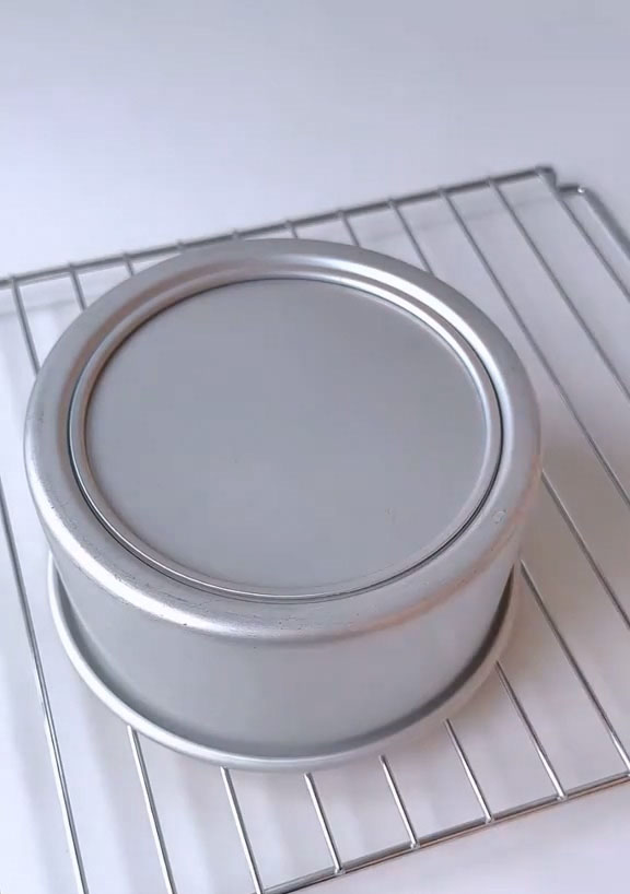 Remove the cake from the oven and immediately invert the pan onto a wire rack