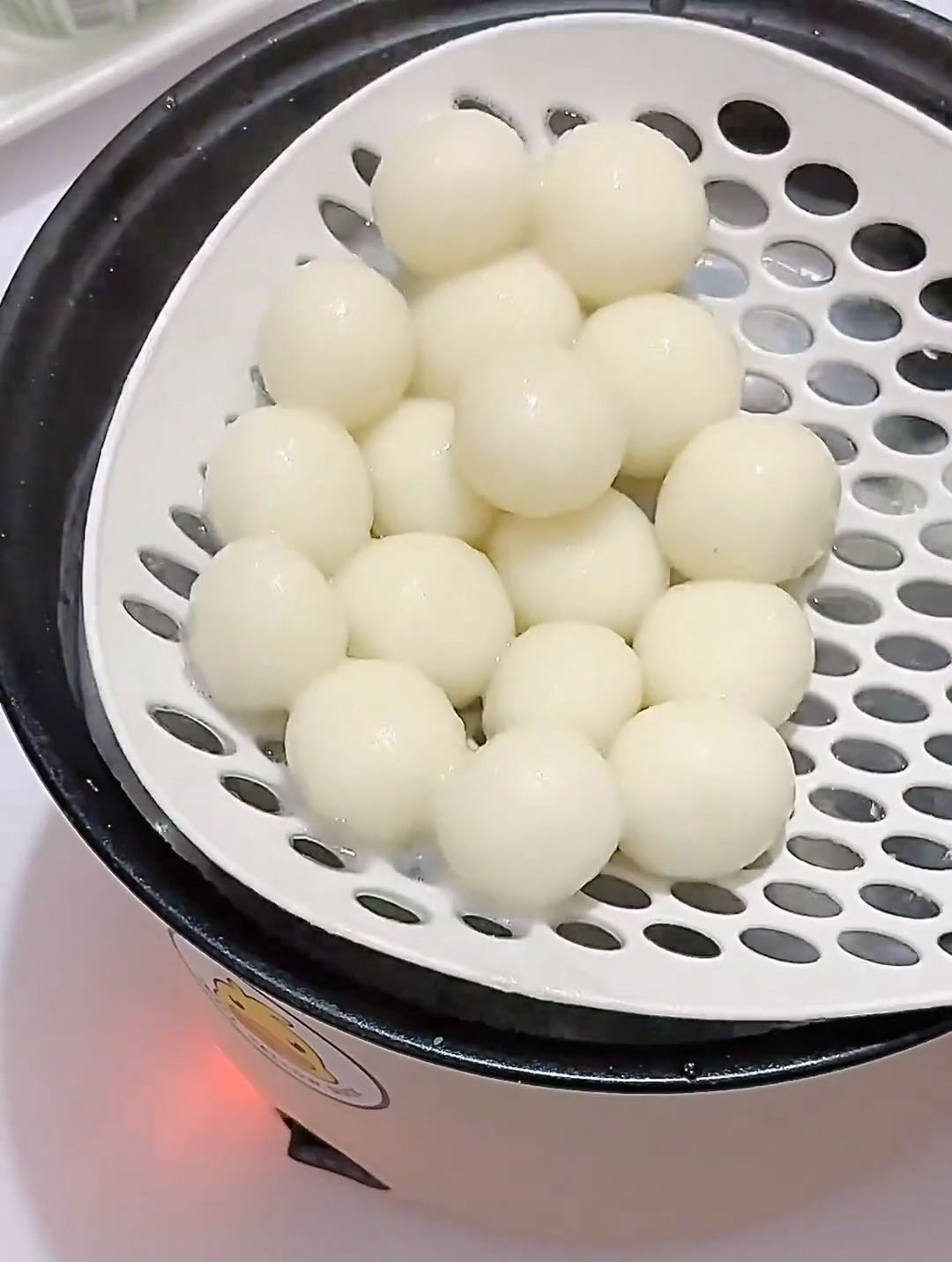 Remove the cooked rice balls from the water