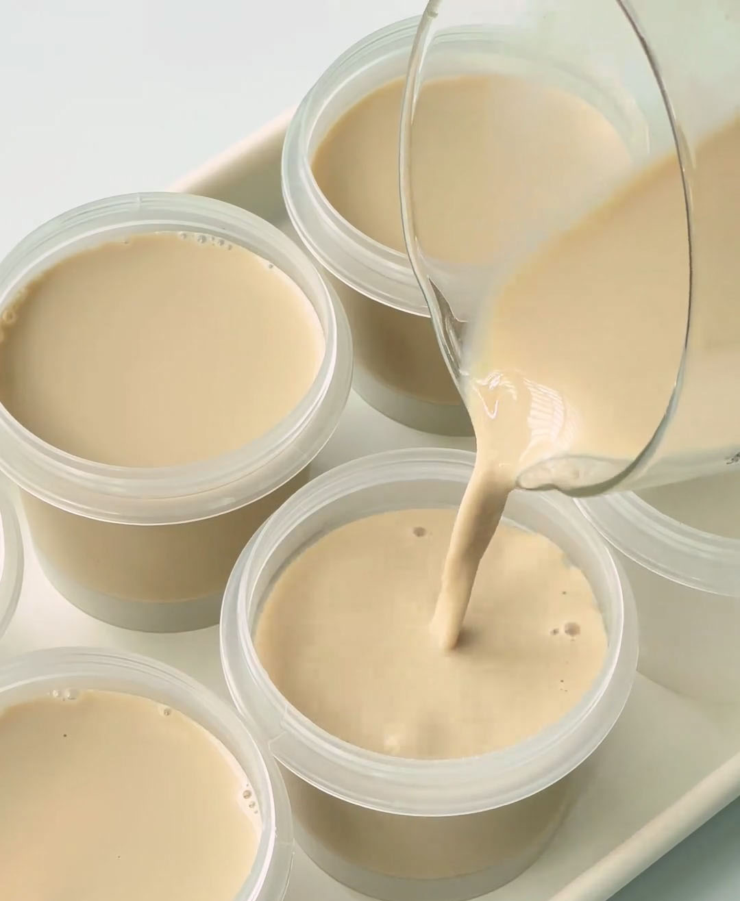 Slowly and carefully pour the finished pudding liquid into your chosen molds or serving cups