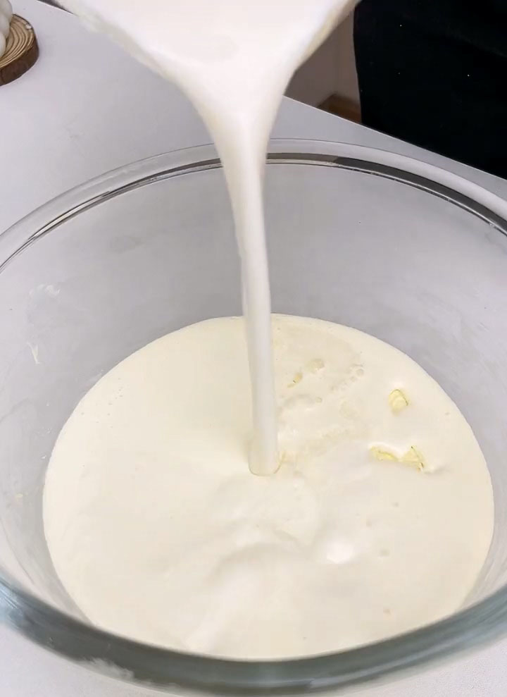 Slowly pour the warm milk gelatin mixture into the lime cream cheese mixture
