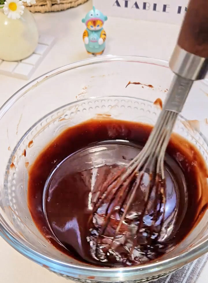 Stir until the chocolate and butter are completely melted and the mixture is smooth and glossy