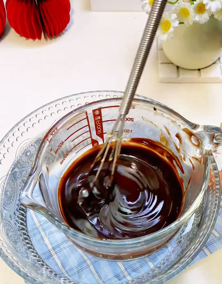 Stir until the chocolate and butter are completely melted and the mixture is smooth and glossy