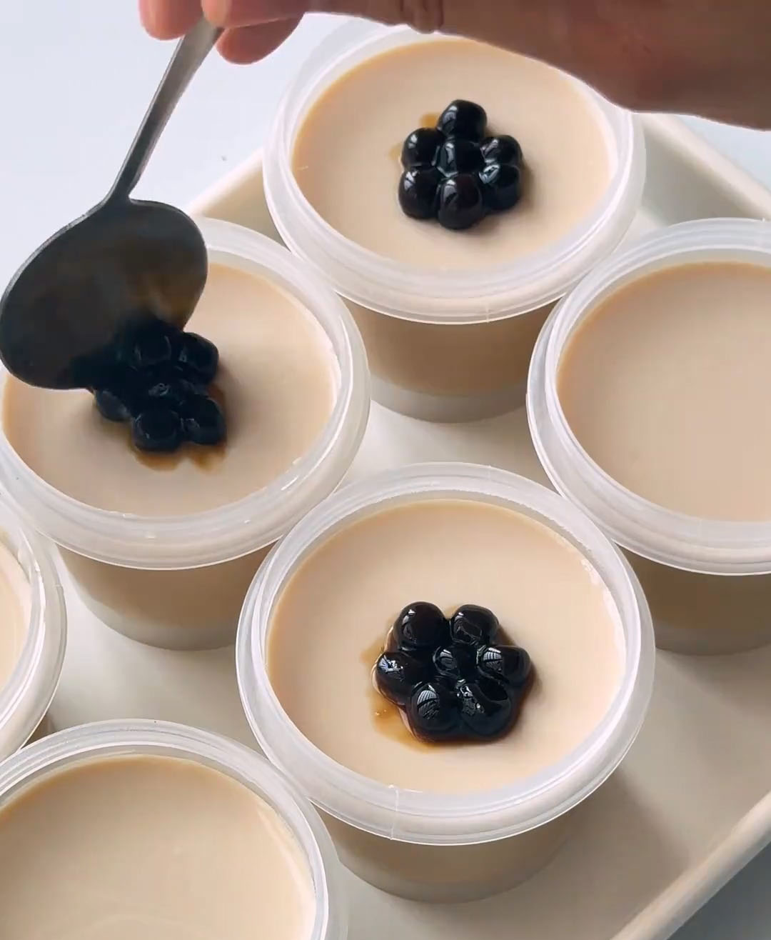 Top each one with a generous spoonful of cooked brown sugar tapioca pearls