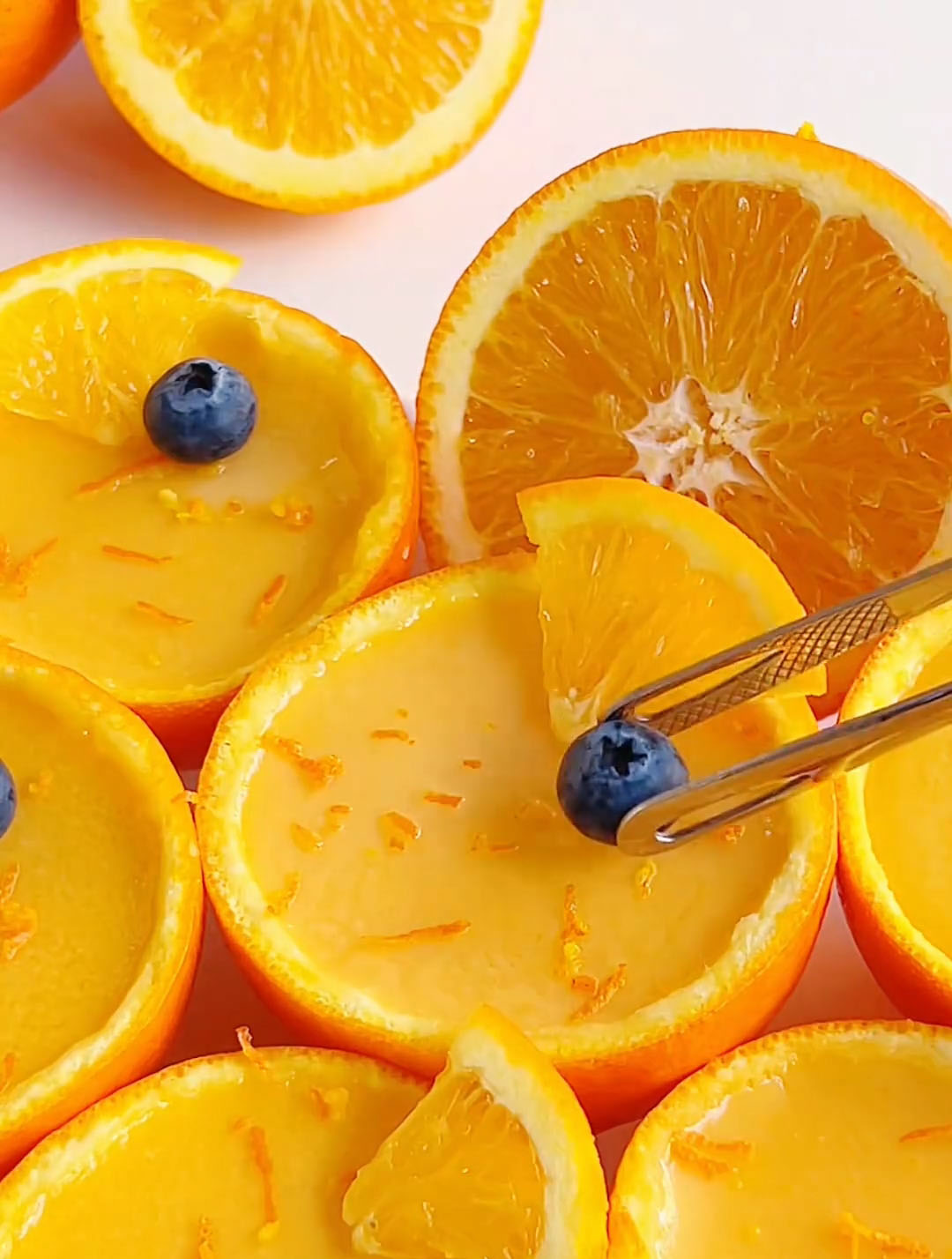 Top with a sprinkle of orange zest, a few blueberries, and some fresh orange segments