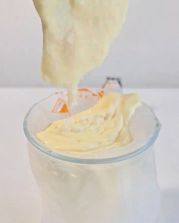 Transfer the mousse mixture into a piping bag