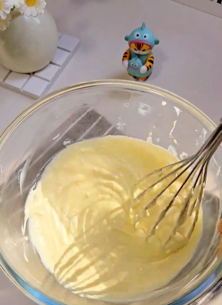 Use a hand whisk to whip until it reaches a thick, yogurt like consistency