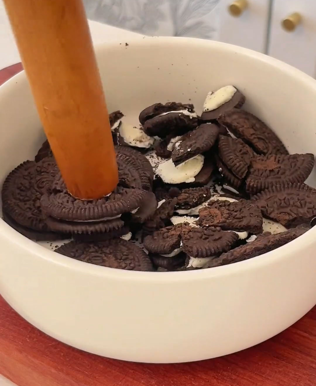Use a rolling pin or the back of a spoon to crush them into fine crumbs