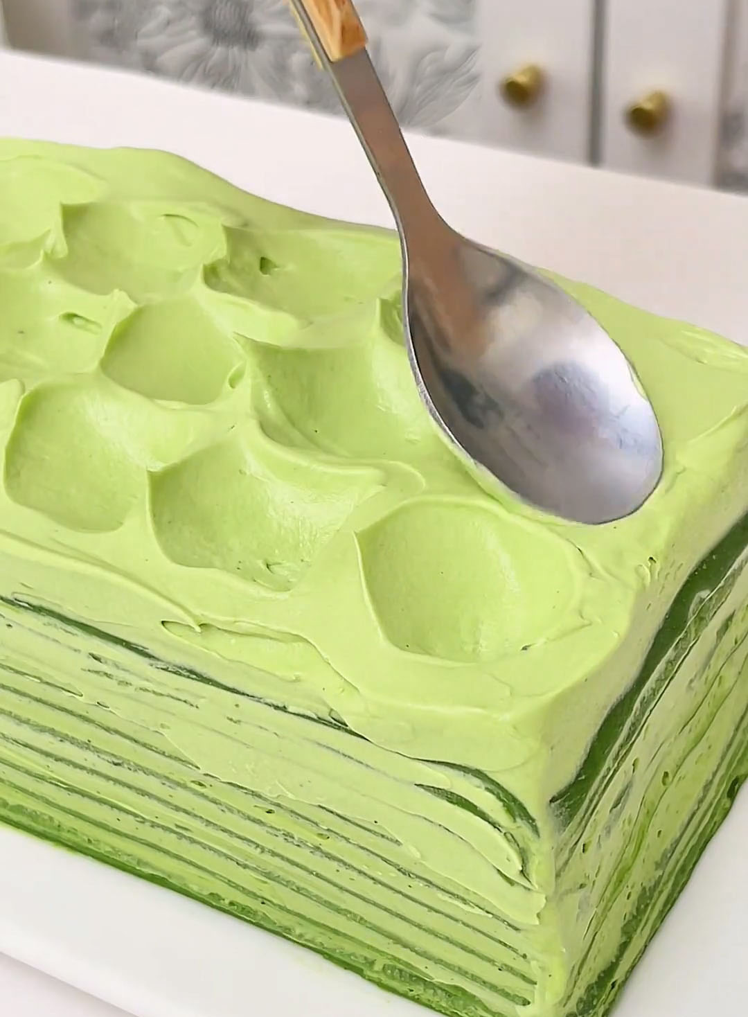 Use a spoon to press down and create an indentation.