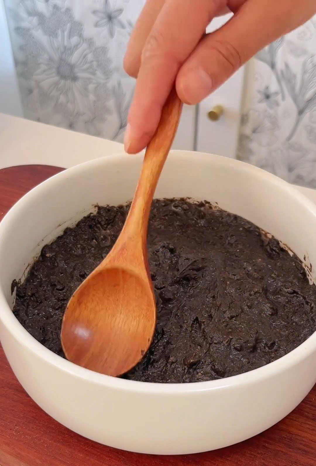 Use a spoon to press it down firmly and smooth the surface