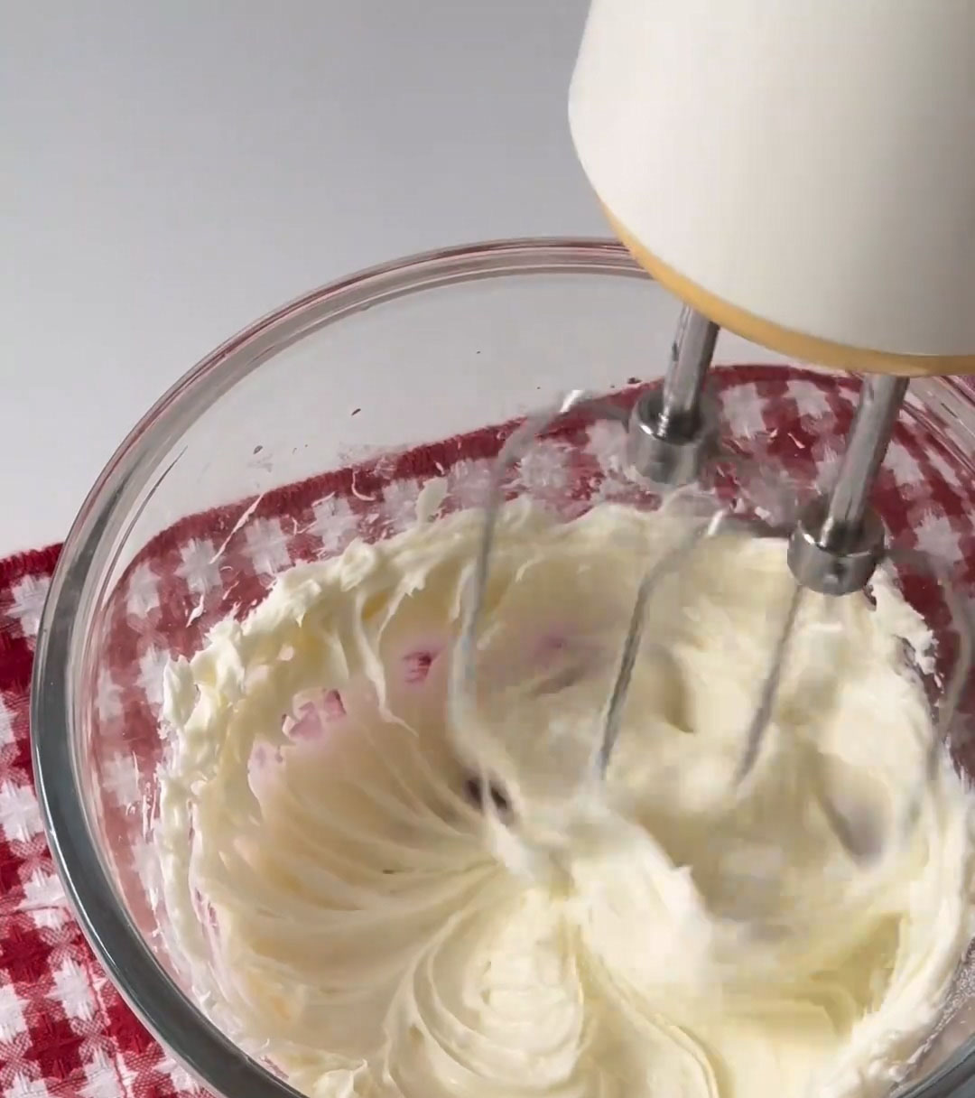 beat the softened cream cheese with granulated sugar