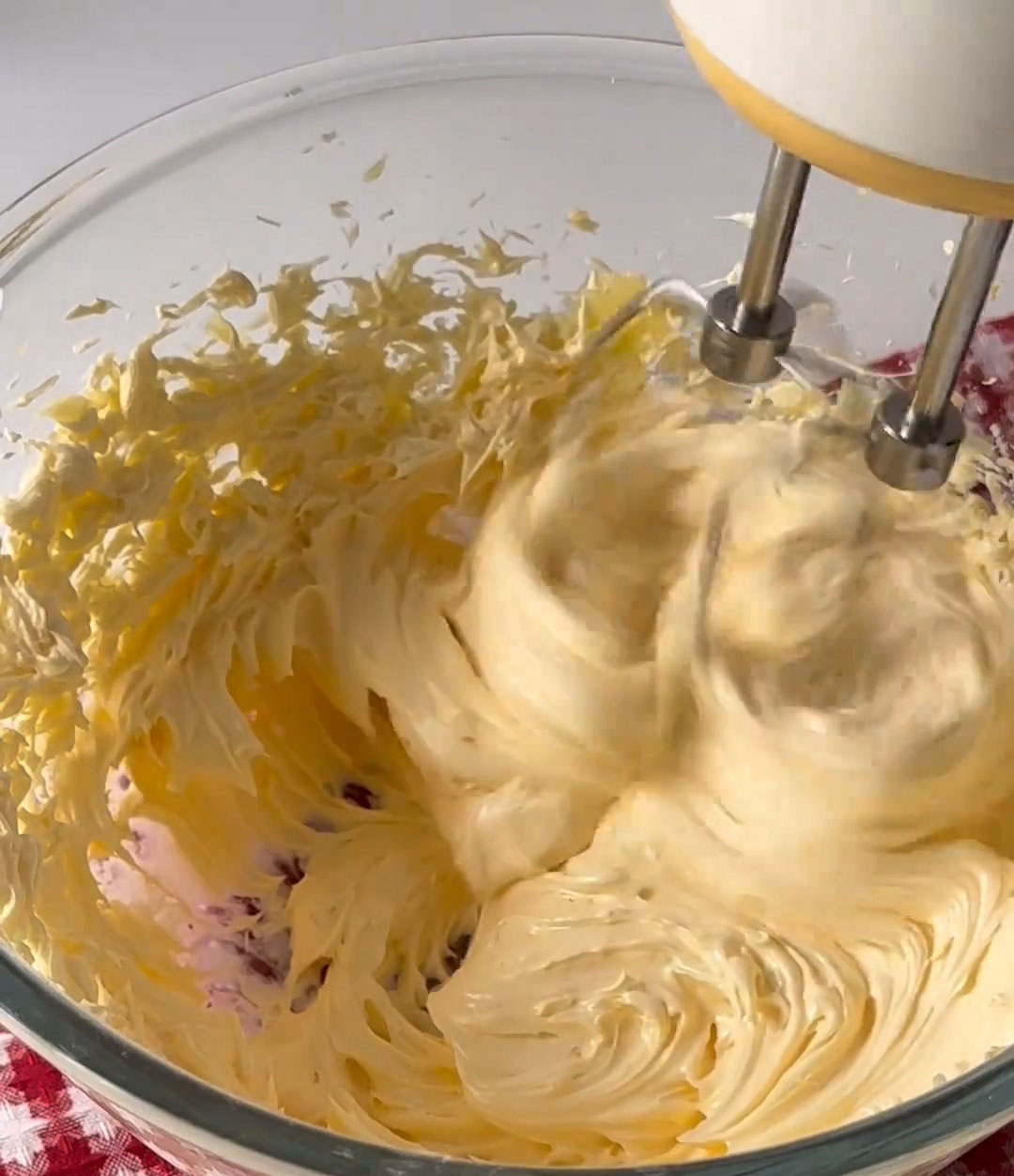 mixing well after each addition