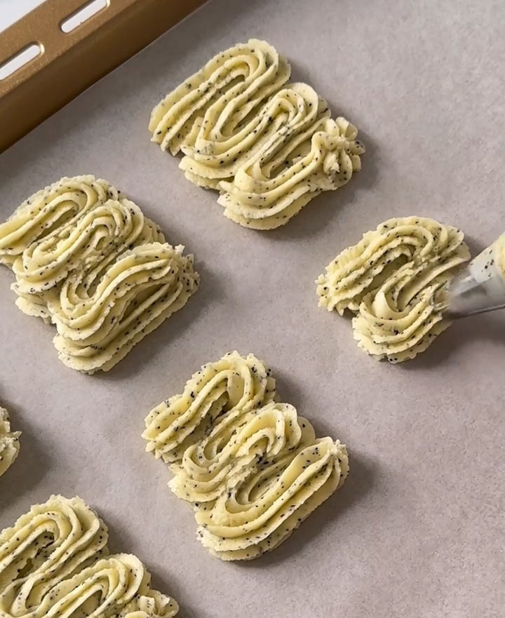pipe your desired shapes onto a lined baking tray