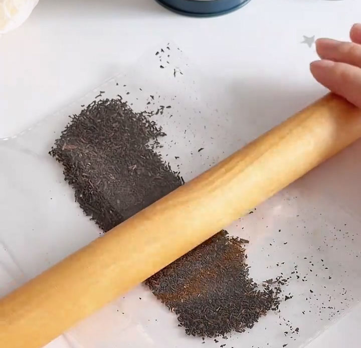 place the tea leaves in a resealable bag and gently crush them with a rolling pin