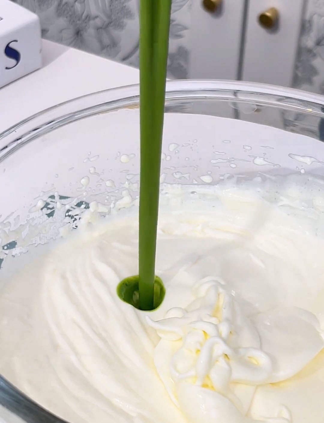 pour it into the bowl of whipped cream