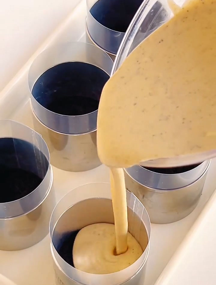 pouring gently to avoid disturbing the crust