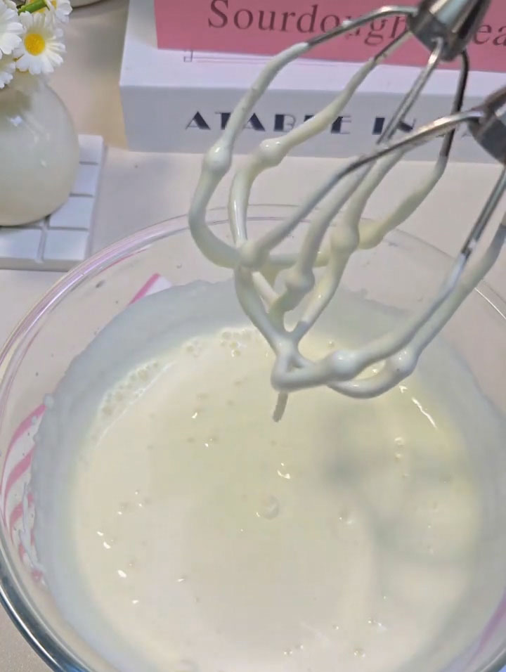 whip the cream until it reaches a thick, yogurt like consistency