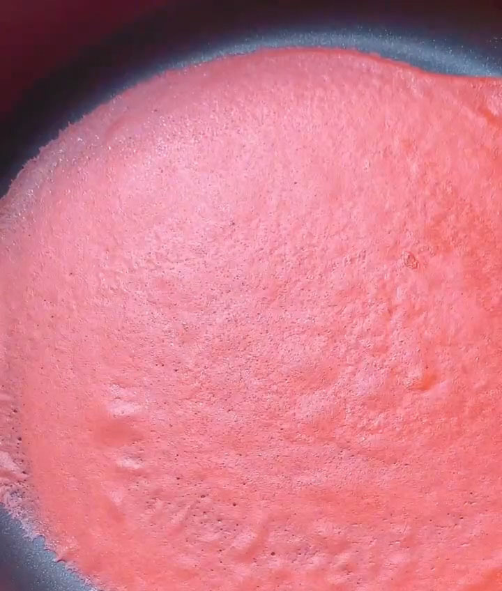 Cook over low heat until the surface of the crepe is set and small bubbles