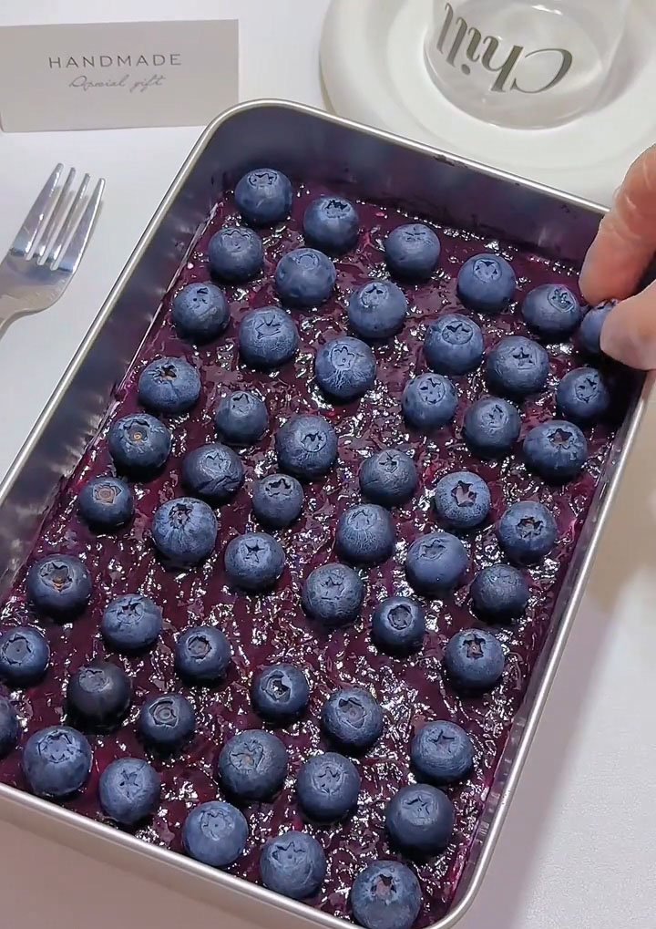 Garnish with fresh blueberries and mint leaves for a beautiful finishing touch