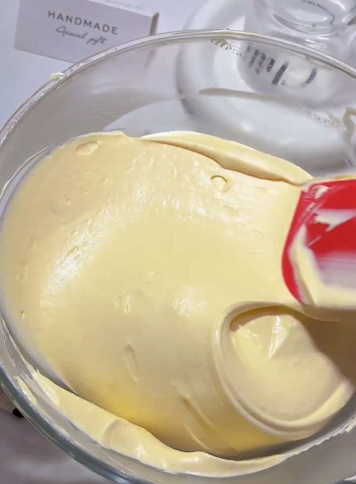 Gently fold the whipped cream into the mascarpone lemon mixture using a spatula