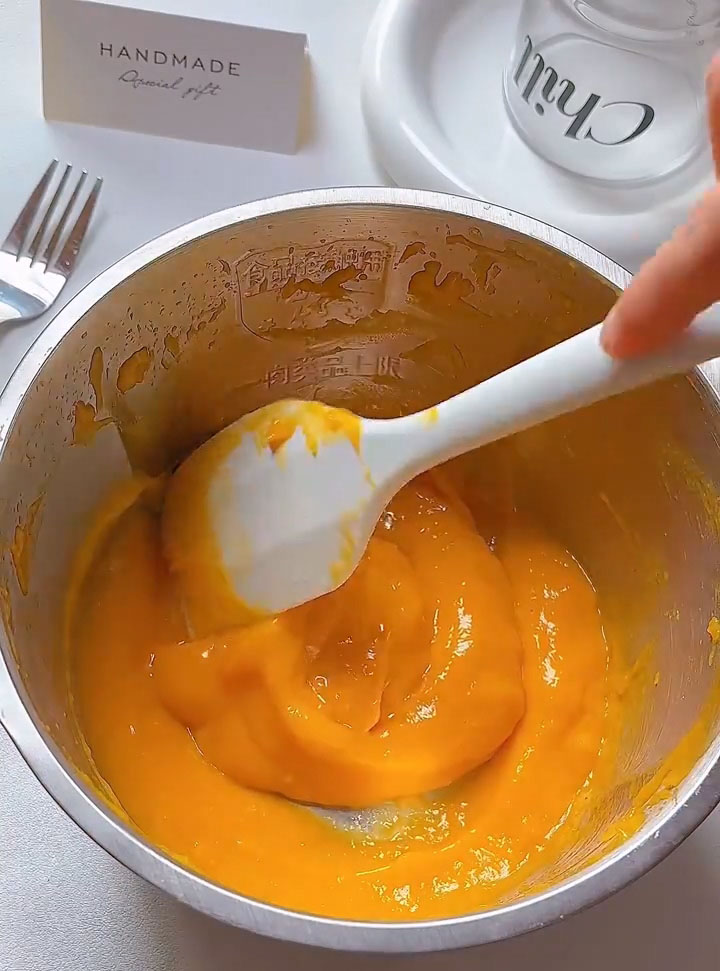 Place the mango flesh in a food processor or blender and blend until smooth to create a mango puree