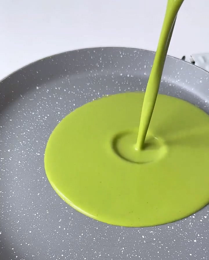 Pour a small amount of batter into the pan