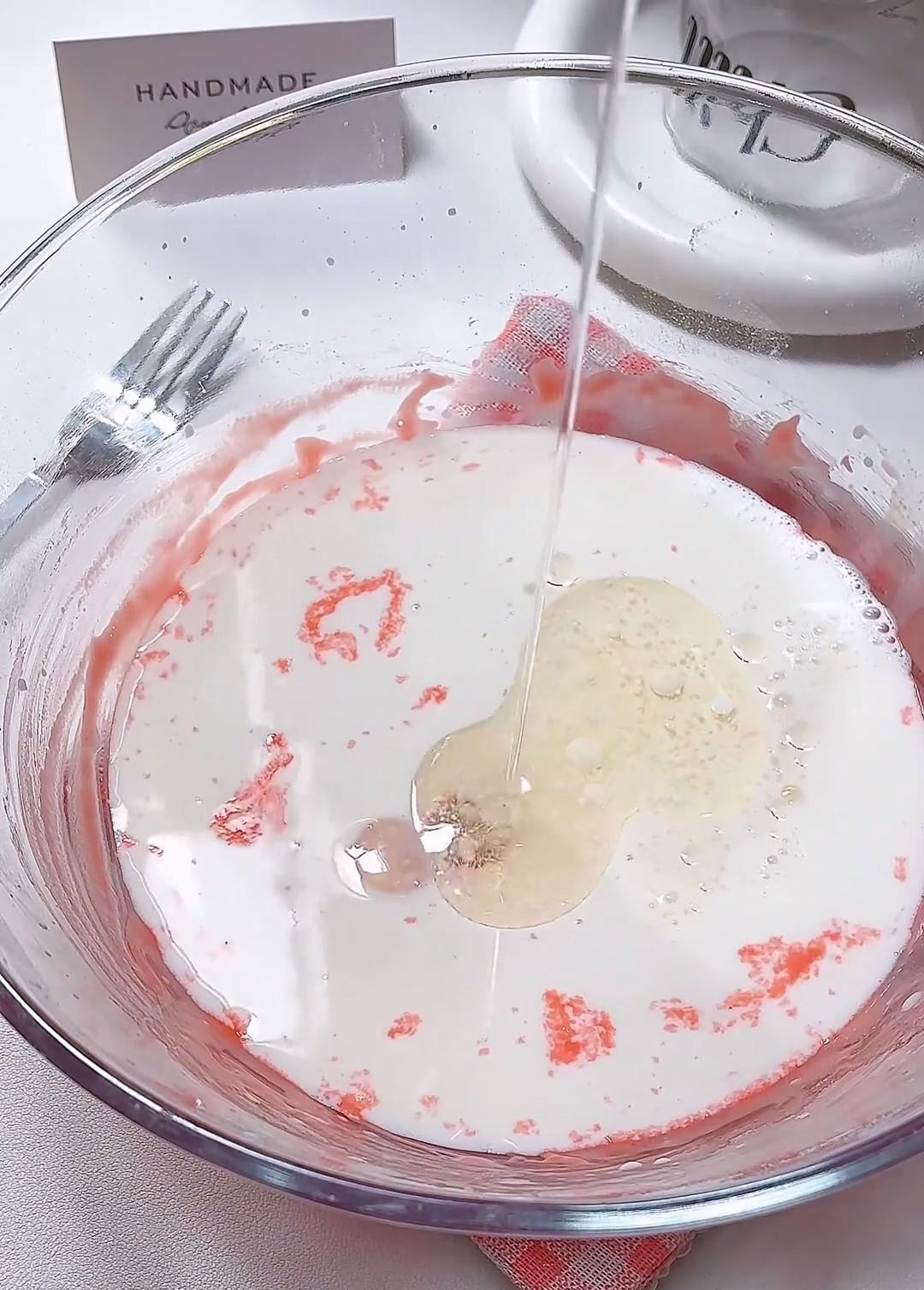 Pour in 180g milk and 30g corn oil