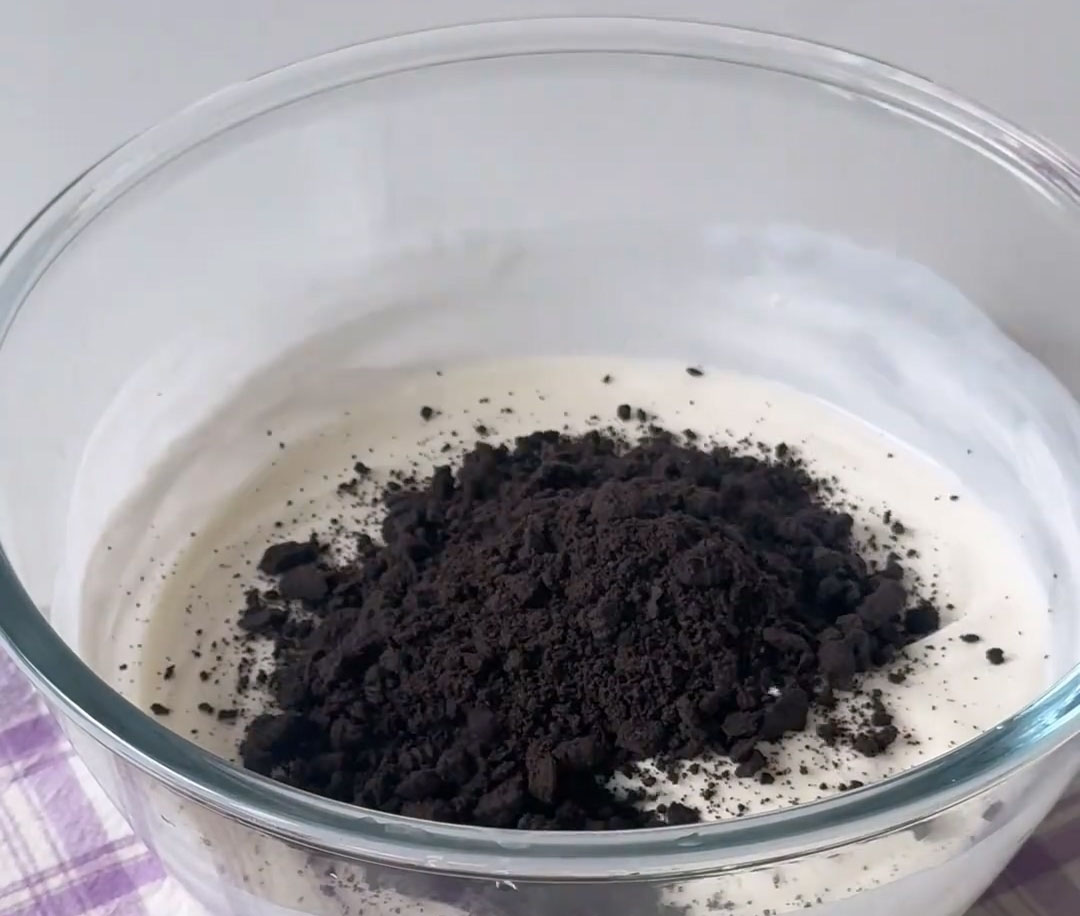 Pour in the crushed Oreos