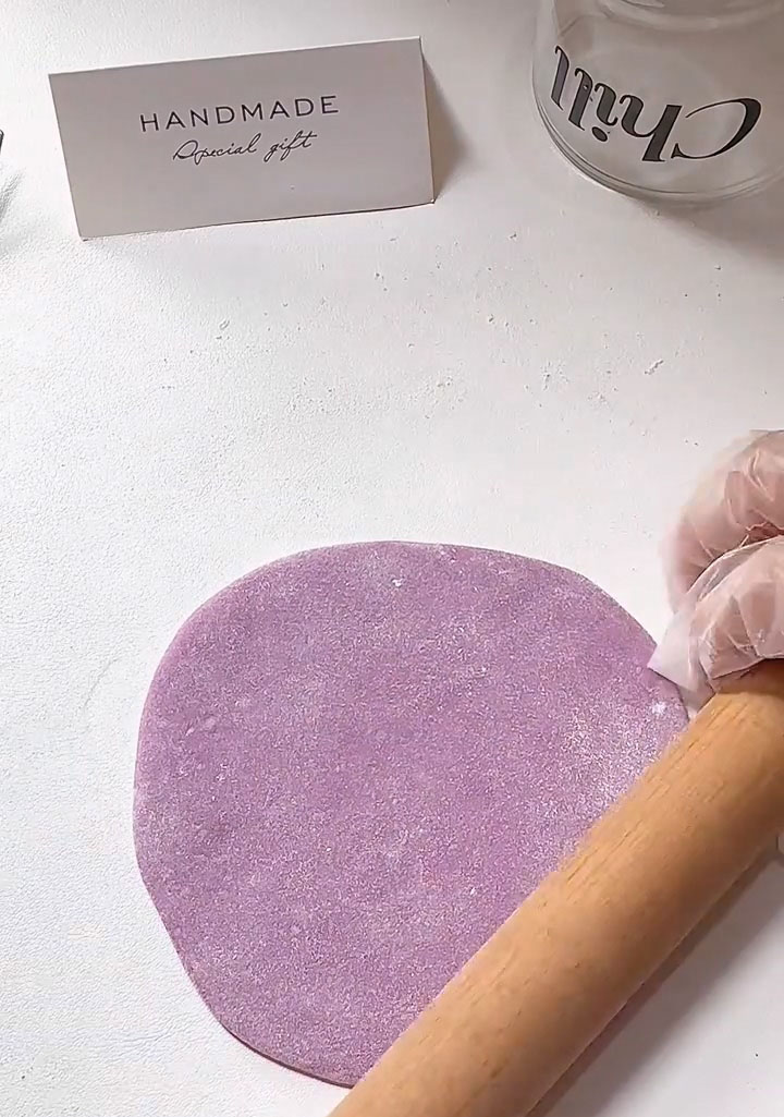 Roll the dough into a thin, flat disc, about 3 4 inches in diameter