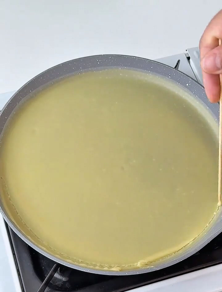 Use a bamboo skewer or a thin spatula to gently run along the edge of the pan to loosen the crepe