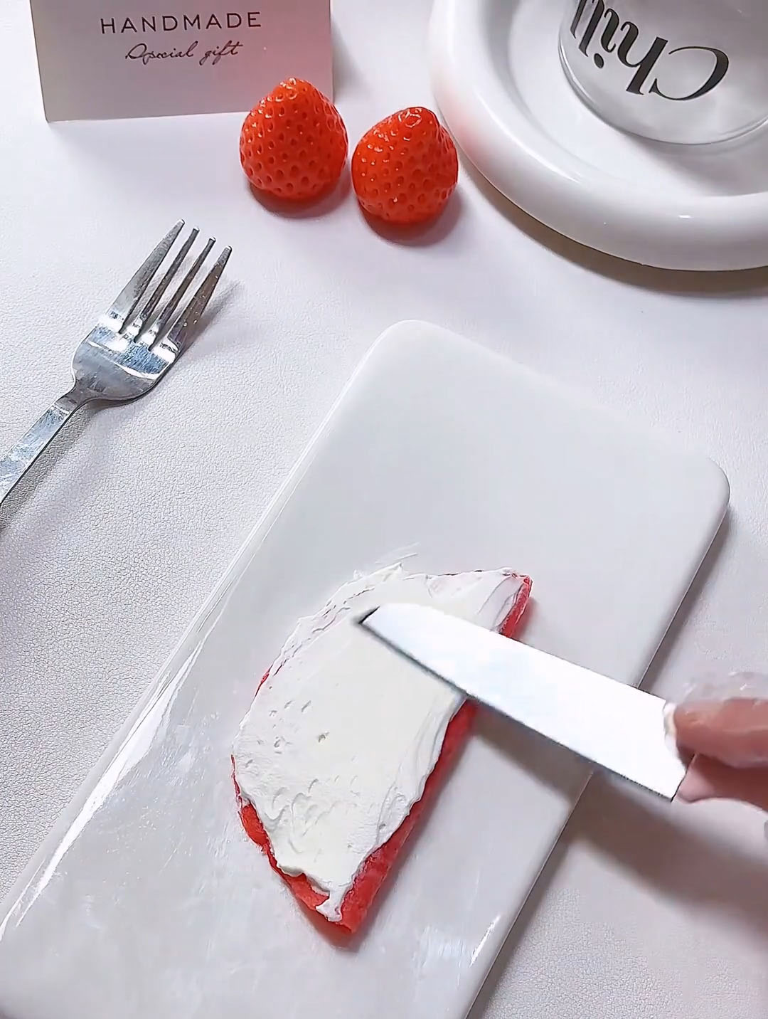 Use a small offset spatula or the back of a spoon to spread the cream into an even