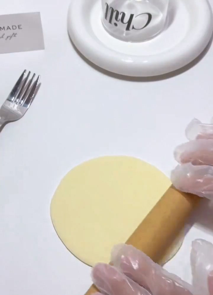 Using a small rolling pin (or even just your fingers), roll the dough into a thin circle, about 3 4 inches in diameter.