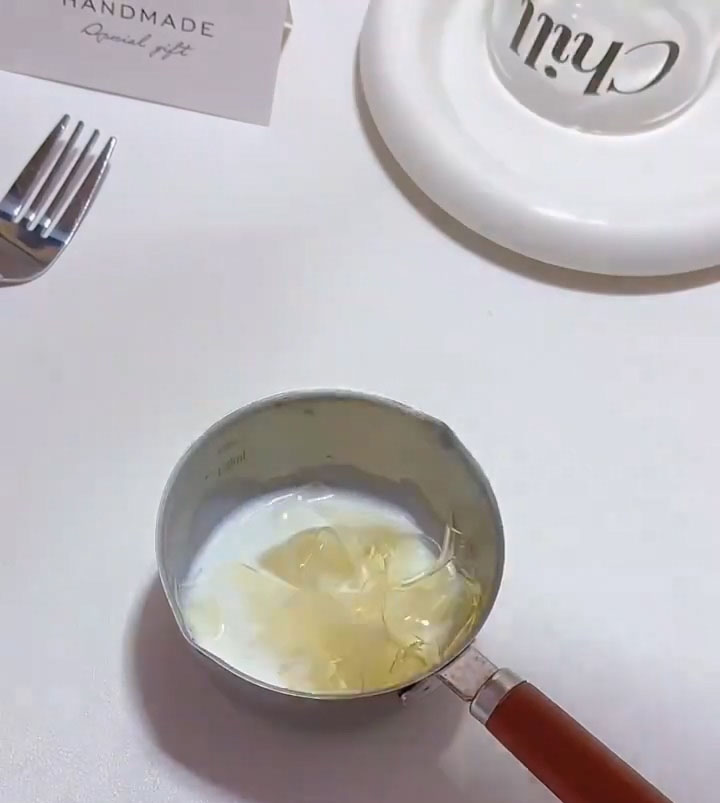 Warm the milk and dissolve the gelatin