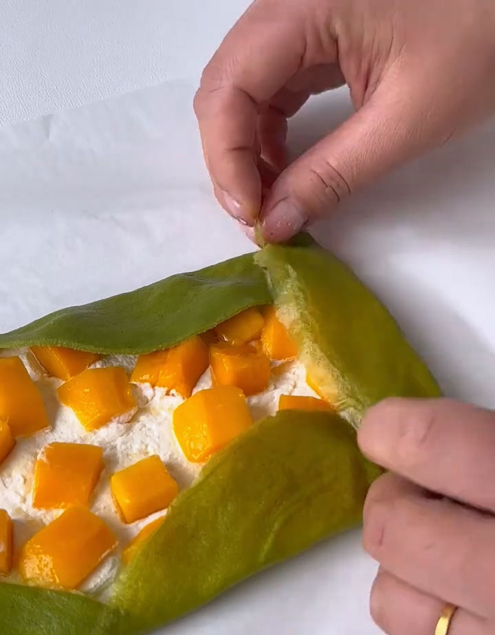 gently lift the crepes and begin rolling away from you