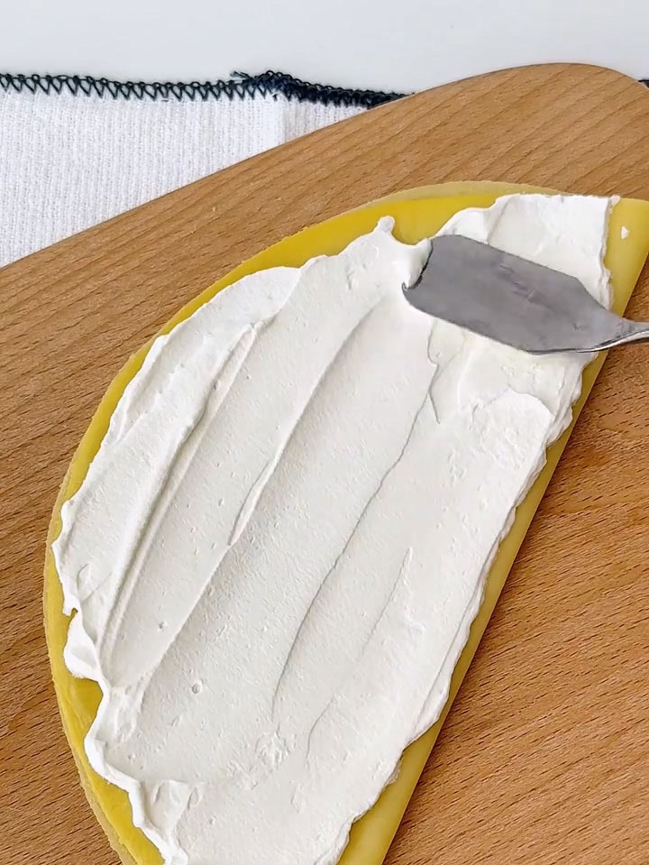 gently smooth it with a spatula