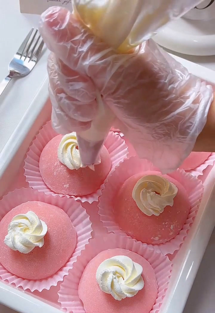 pipe a small decorative swirl of the remaining whipped cream