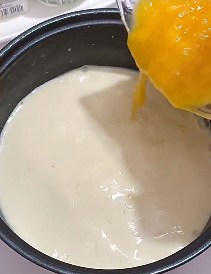 pour in the 150 g of prepared mango puree