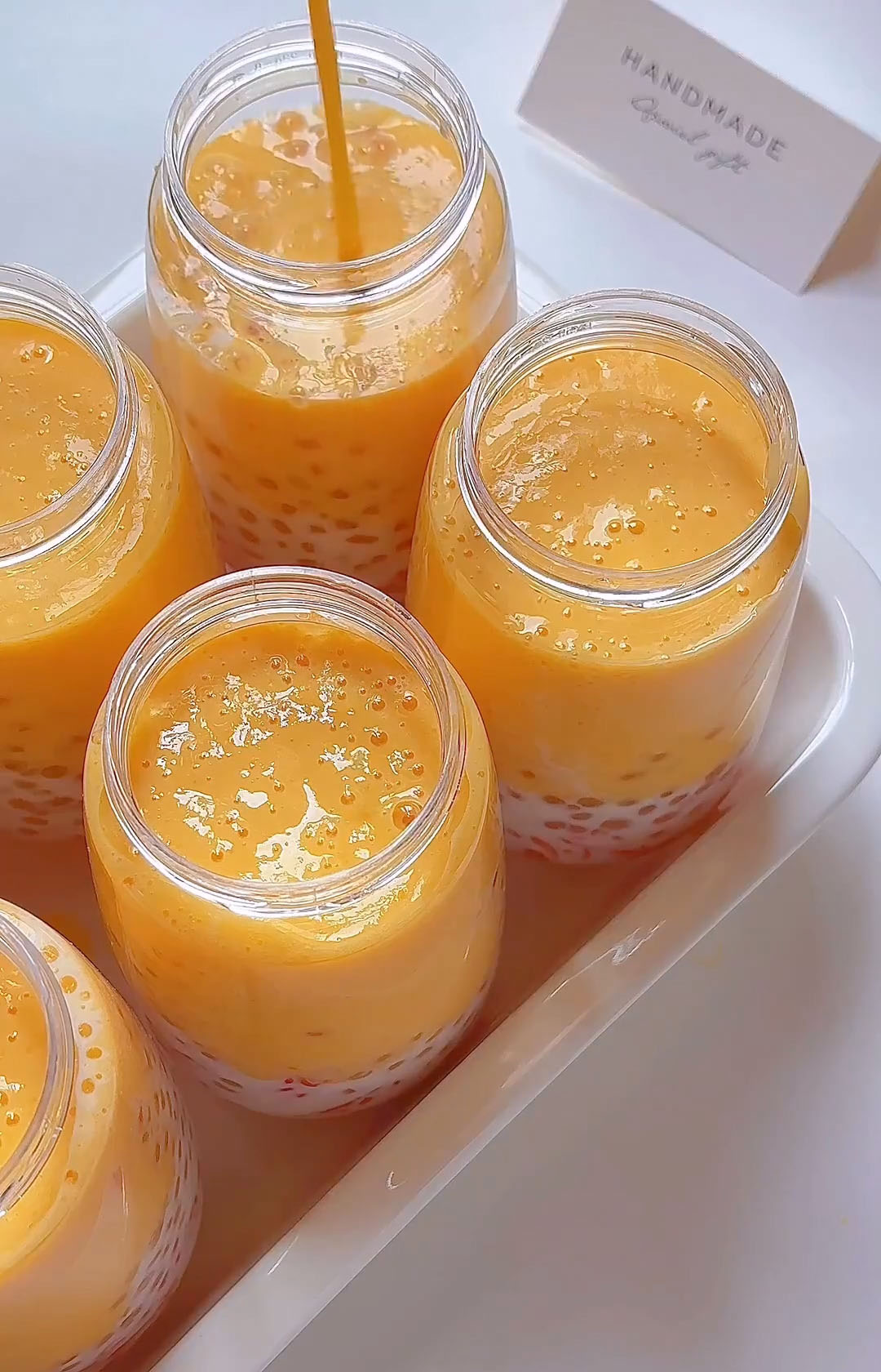 pour the blended mango coconut cream over everything