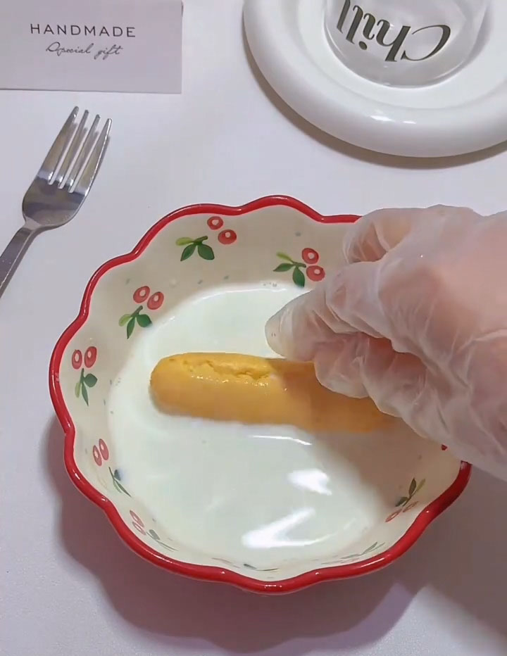 quickly dip both sides into the milk