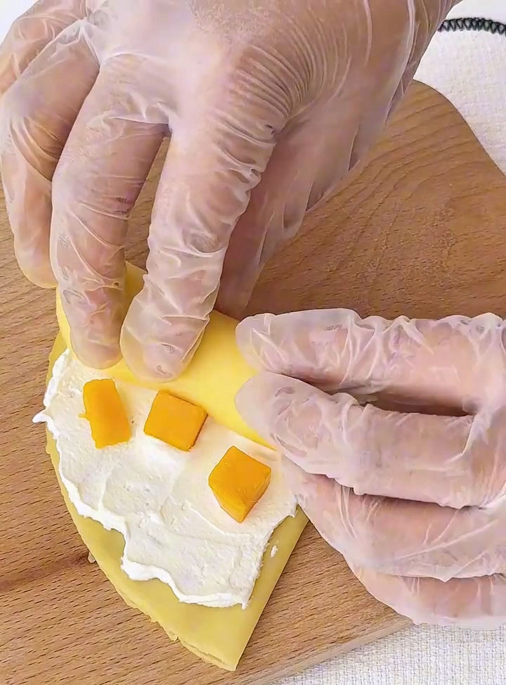 roll the crepe into a tight cylinder