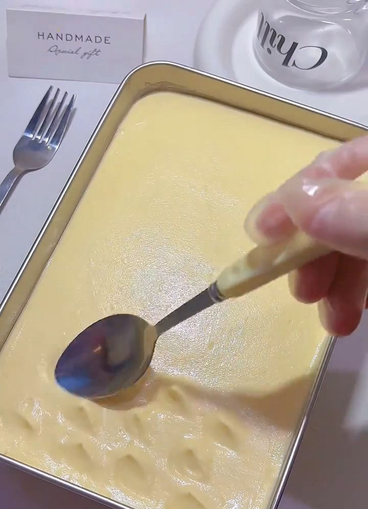 use the back of a spoon to create decorative (indented) swirls or wavy patterns across the surface