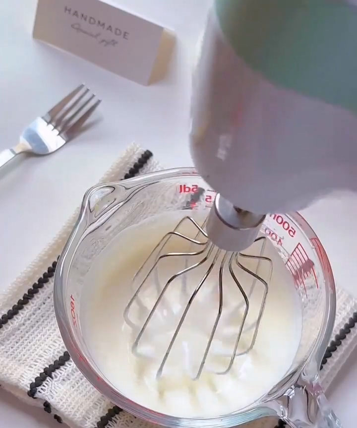 whip the cream until it reaches a thick yogurt like consistency